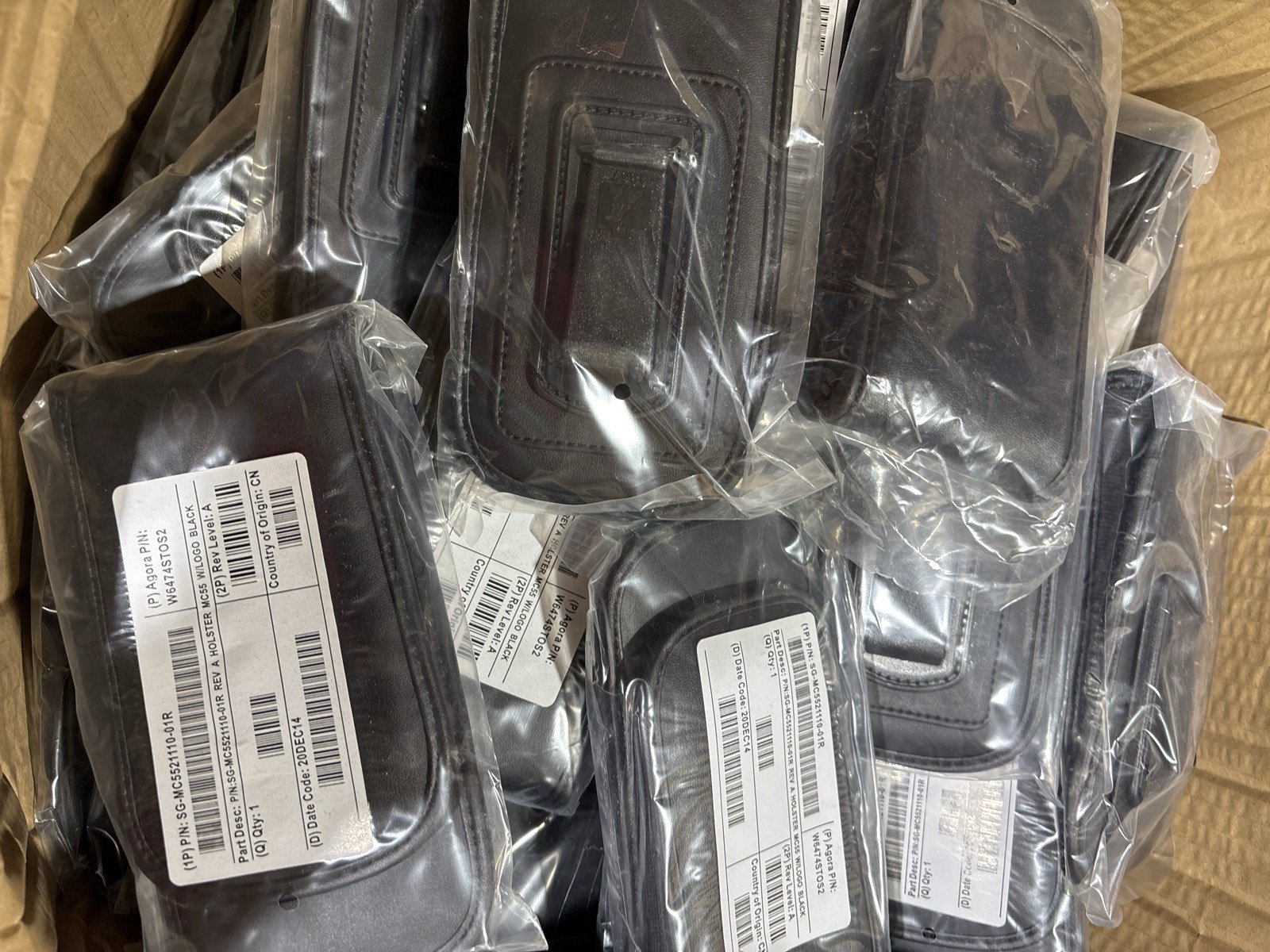 Source photograph for Joblot: 170x Motorola Zebra Soft Leather Holster Belt Clip For MC55 MC65 MC67